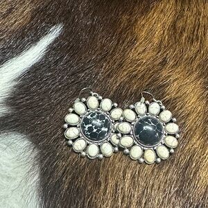 Chic Black and Cream Floral Earrings
Squash blossom designs